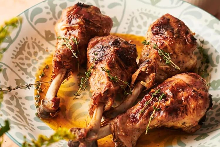 Four savory turkey legs served family-style, a hearty addition to any Snoqualmie Thanksgiving table.